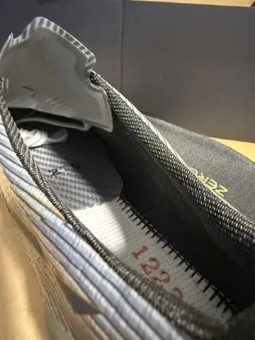 Insole lifted out of a Mizuno Alpha 2 Japan to show the KaRVO insert through the forefoot